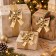 Set 24 Fiocchi Dorati di Natale da Appendere 12 cm, in ambiente natalizio