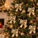 Set 24 Fiocchi Dorati di Natale da Appendere 12 cm, in ambiente natalizio