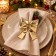 Set 24 Fiocchi Dorati di Natale da Appendere 12 cm, in ambiente natalizio
